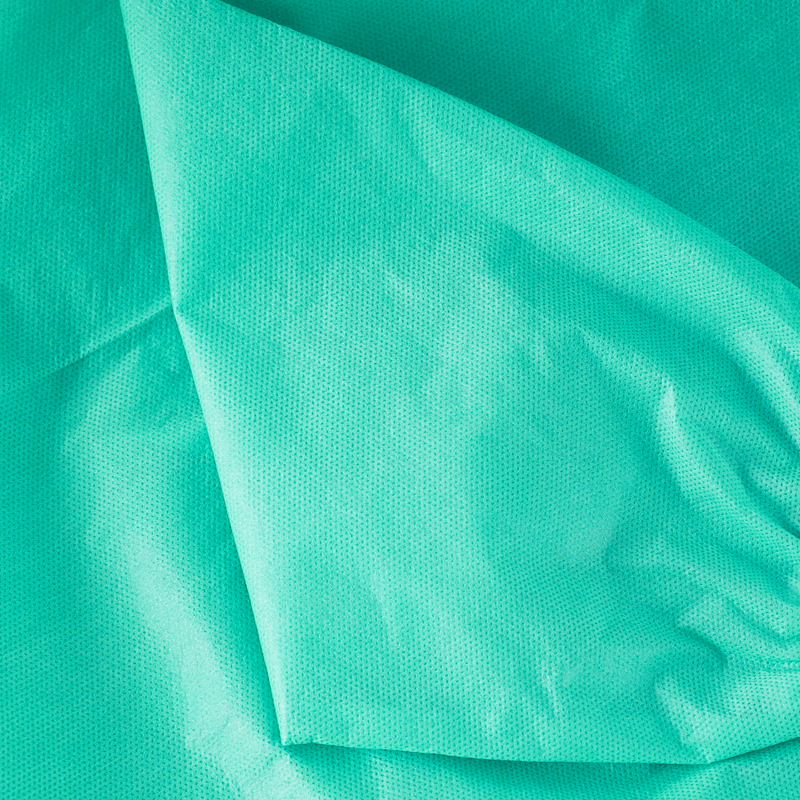 Fartuch jednorazowy zielony XXL z gumką (flizelina 24g) 10szt