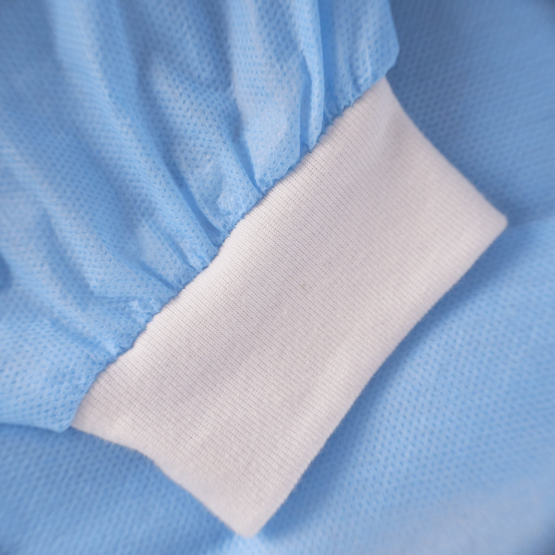 Fartuch jednorazowy niebieski L z mankietem (flizelina 24g) 10szt