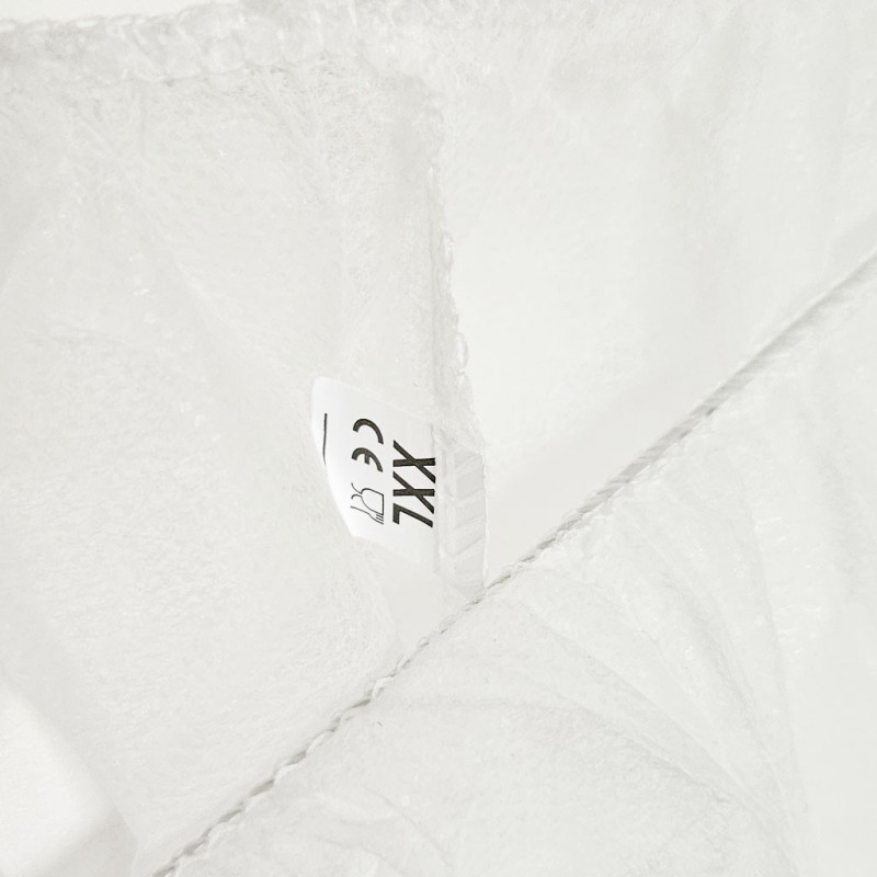 Spodnie jednorazowe XXL na gumce białe flizelina 30g 1szt